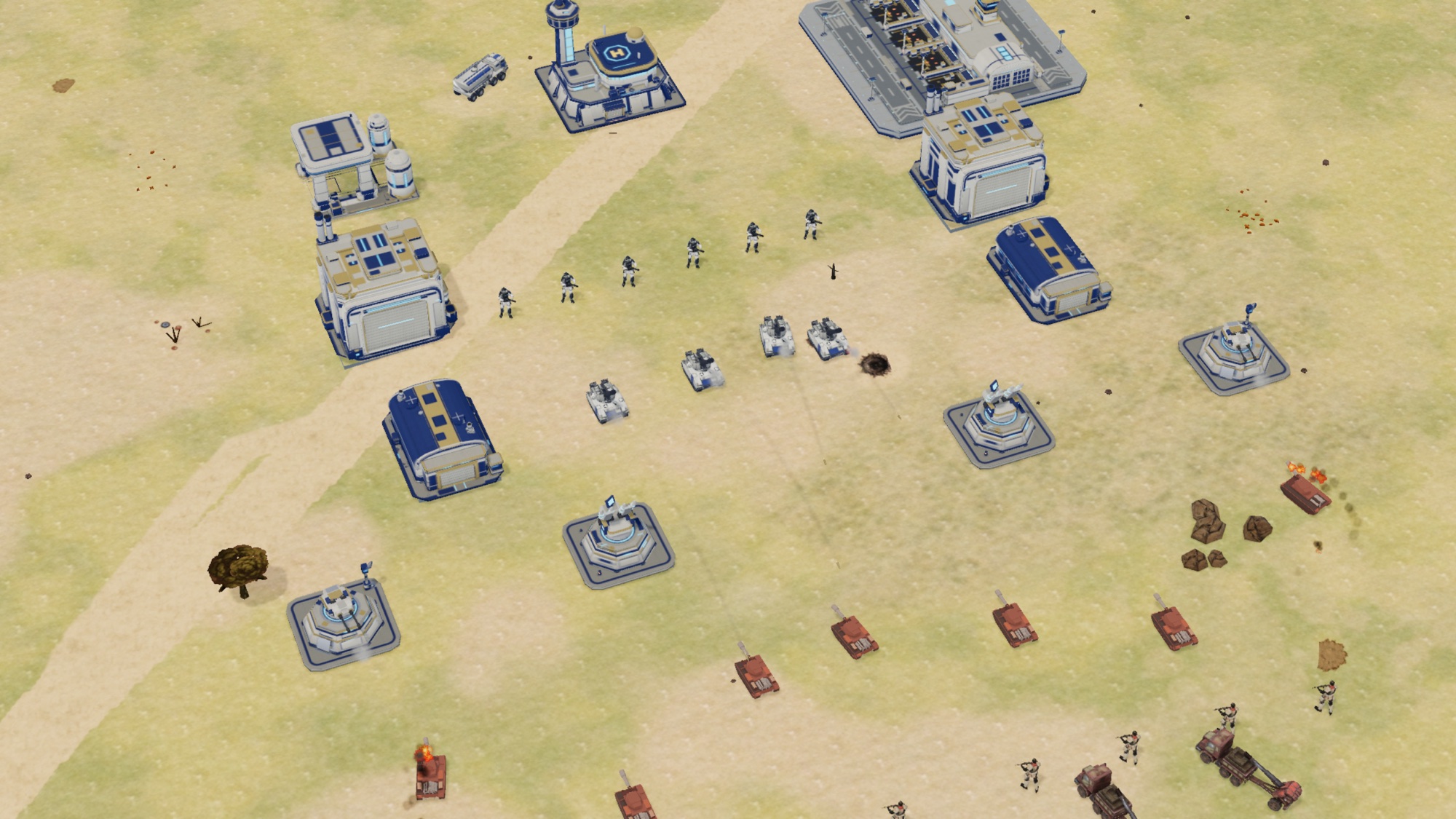 A Coalition base in action: headquarters, refinery and factory behind a line of armour and infantry under fire